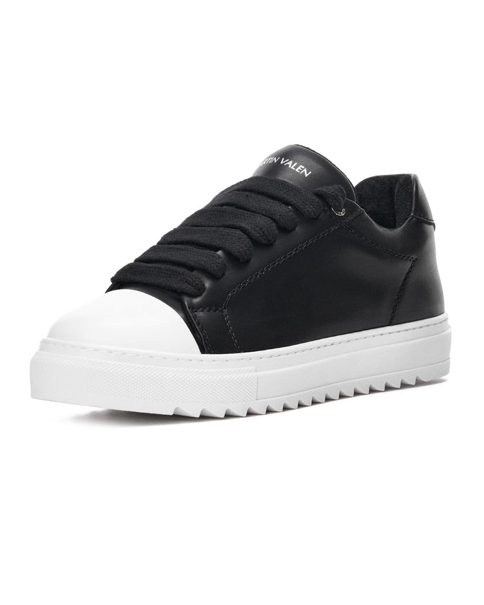 Martin Valen Artisan Cupsole Low black sneaker with white sole, side profile showing upper and side stitching