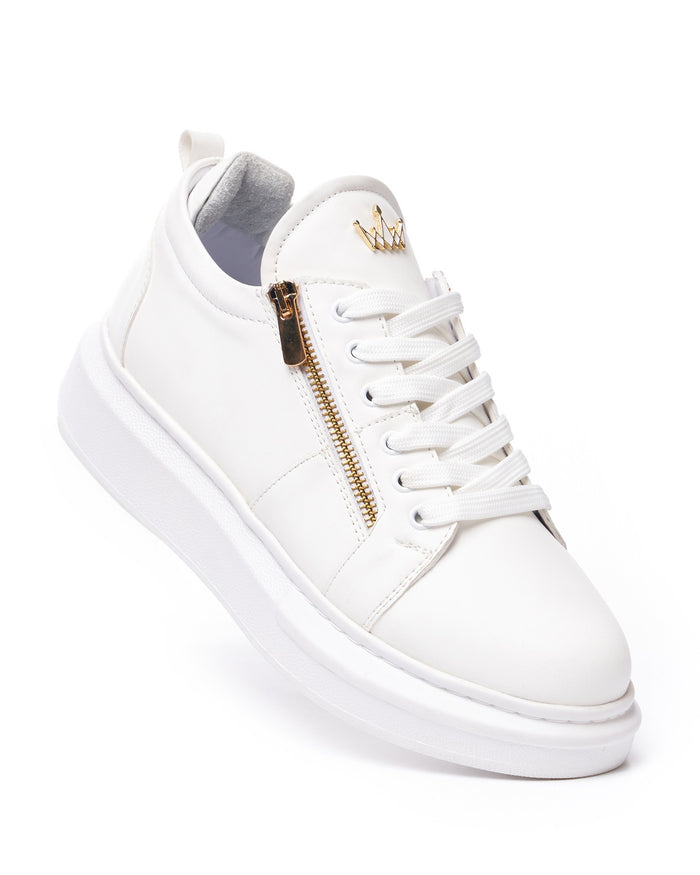 Martin Valen white chunky sneakers close top view showing laces, gold side zipper and small gold crown logo on the tongue
