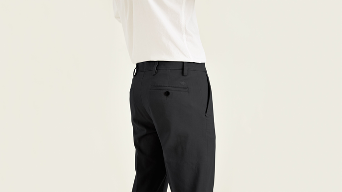 View of model wearing Black Easy Khakis, Slim Fit.