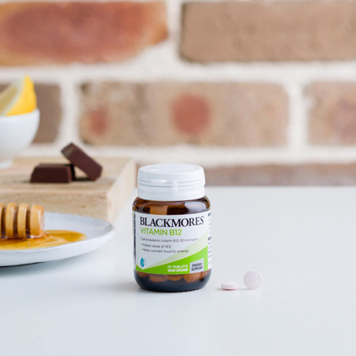Blackmores Vitamin B12 supplement bottle on a white surface.