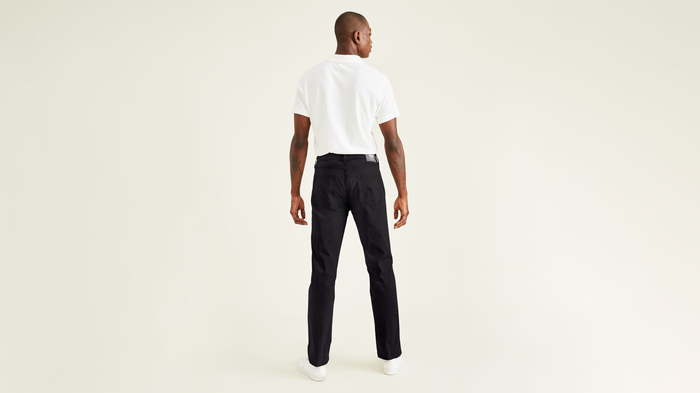 Back view of model wearing Black Jean Cut Pants, Straight Fit.