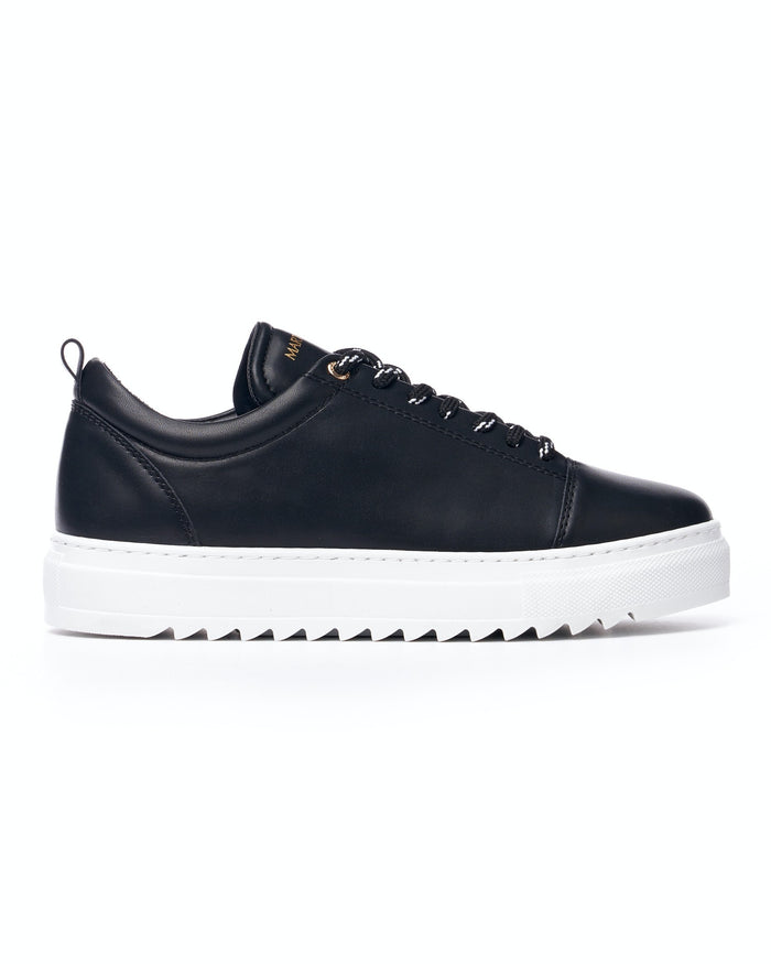 Martin Valen Artestitch men’s low-top black and white sneakers, side profile showing white serrated platform sole