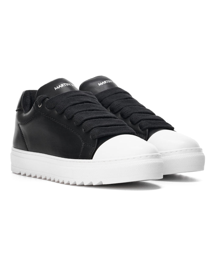 Martin Valen Artisan Cupsole low black-white sneakers, close top view highlighting wide black laces and logo on tongue