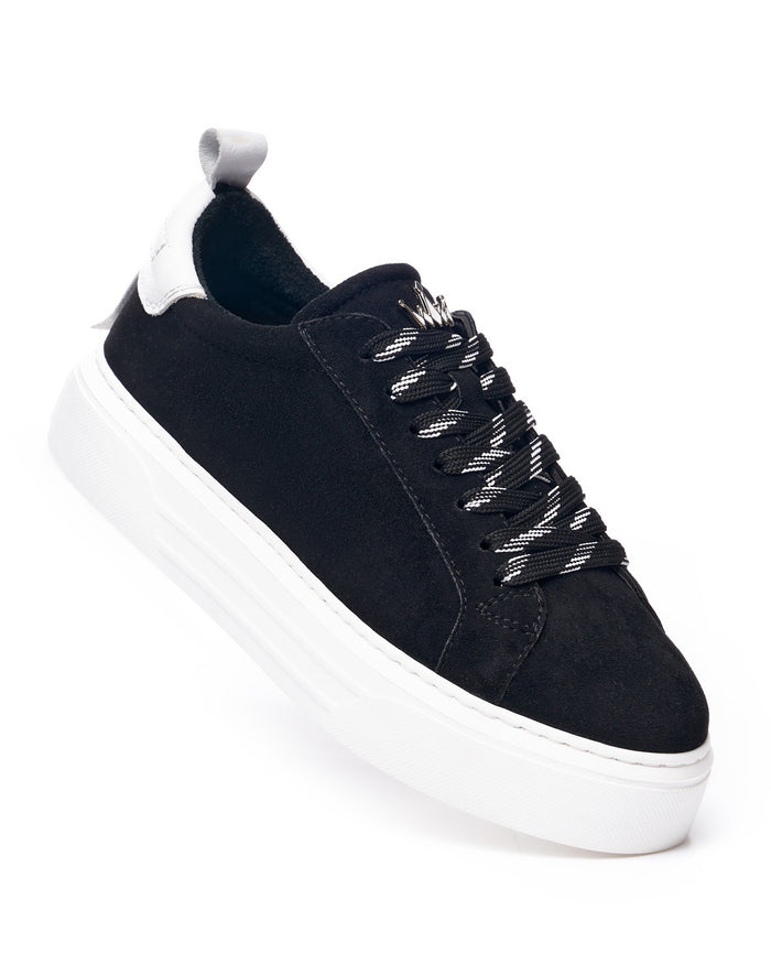 Martin Valen Bobe close-up rear view of thick white platform sole with embossed logo and black suede upper