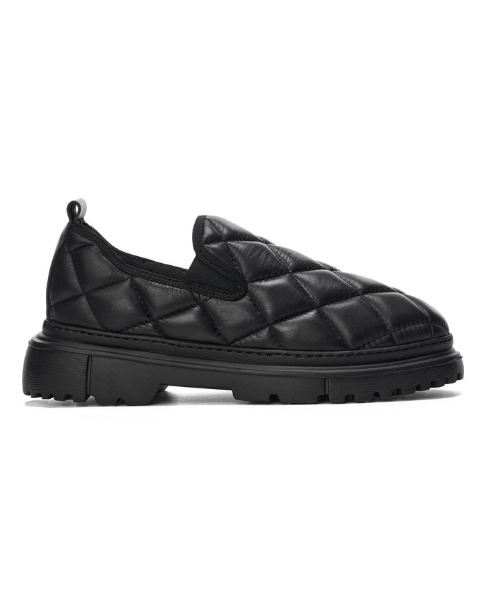 Martin Valen Bold Capitone black shoes, side close-up showing quilted upper and chunky lug sole.