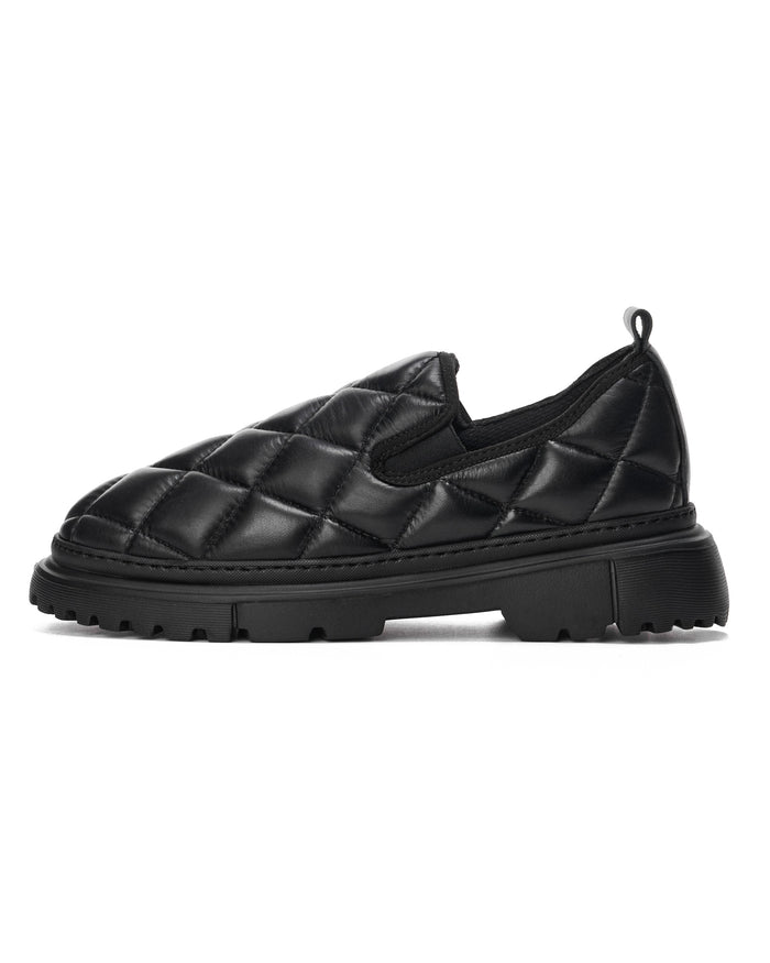 Martin Valen Bold Capitone black shoes close side view of vamp showing quilted pattern and elastic gore detail