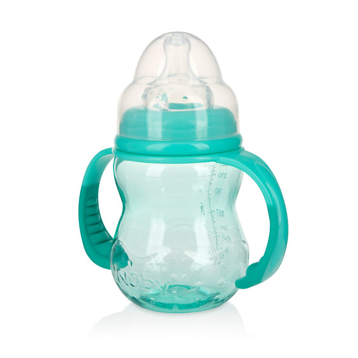 The Bottle-to-Cup Wide Neck Bottle features a translucent turquoise design, two side handles for easy gripping, a clear no-spill spout, and measurement markings to help infants transition from bottle to cup.