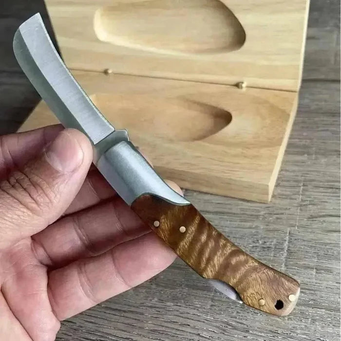 Buffalo River Biltong Tjom Knife with sharp curved stainless steel blade and sturdy laminate wood handle for slicing biltong