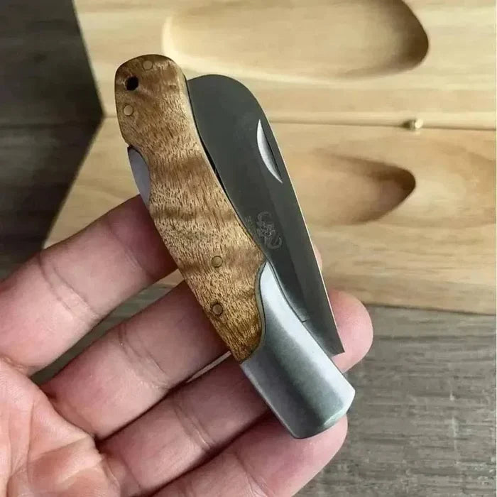 Buffalo River Biltong Tjom Knife with sharp curved stainless steel blade and wooden handle for slicing biltong