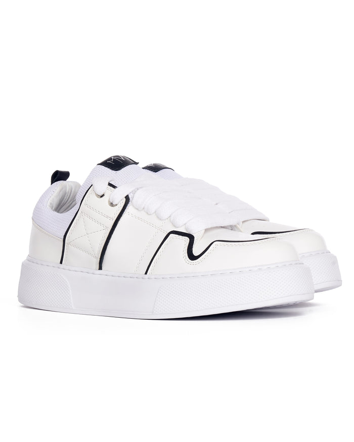 Martin Valen white sneaker side view on white background, textured thick sole and black line detailing