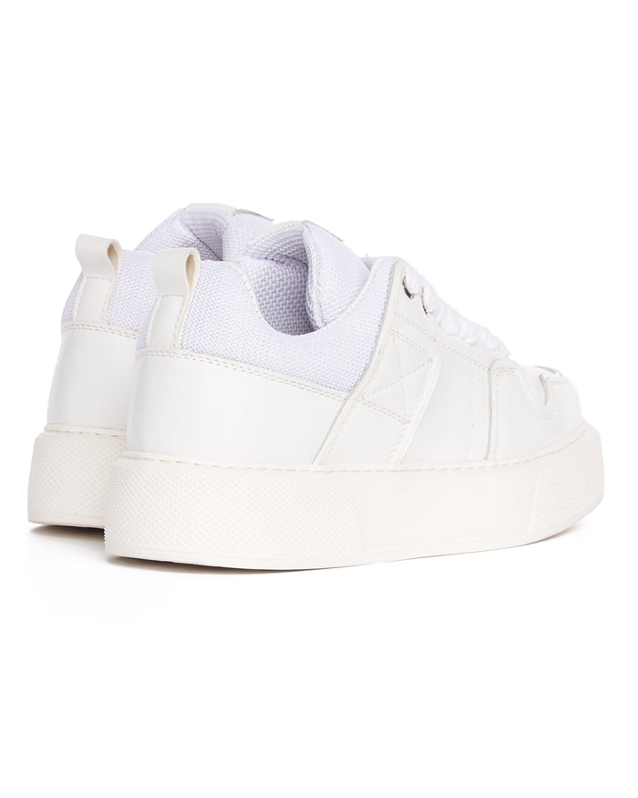 Martin Valen bulky white sneakers, rear close-up showing heel pull tab and textured platform sole