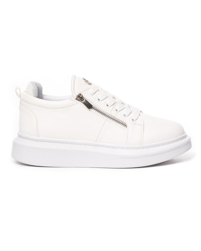 Martin Valen white designer chunky sneaker side profile showing silver zipper, thick white sole and laced upper