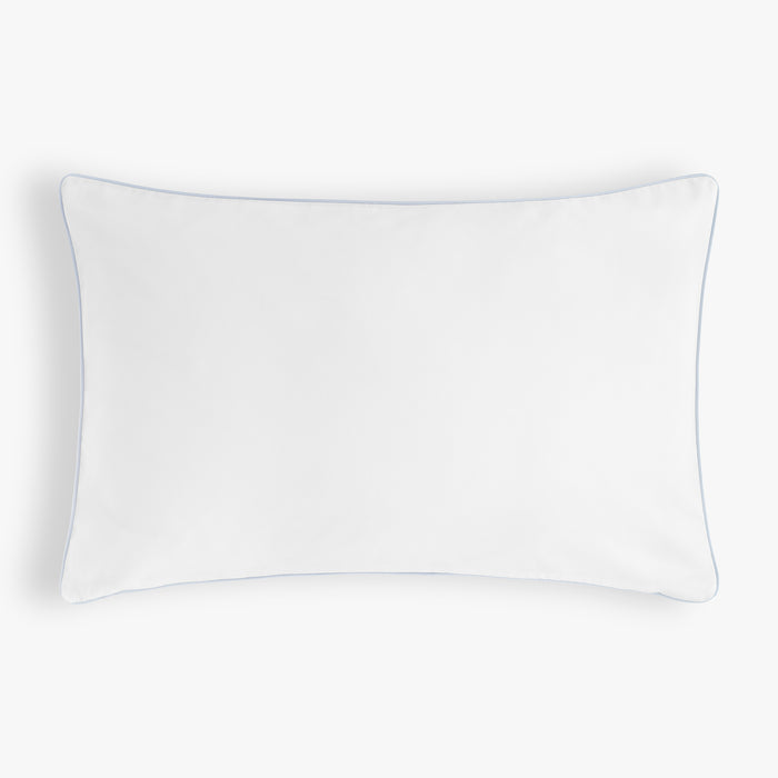 Classic Blue Polka Dot white backside pillow Blue piping on a white background