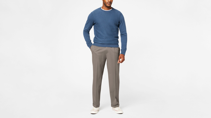 View of model wearing Dark Pebble Comfort Khakis, Pleated, Relaxed Fit.