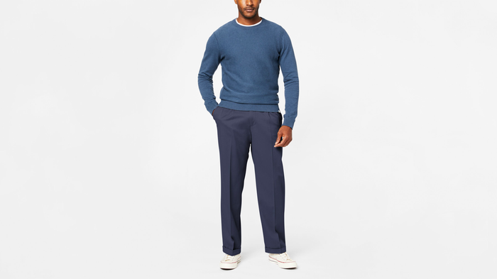 Front view of model wearing Navy Comfort Khakis, Pleated, Relaxed Fit.