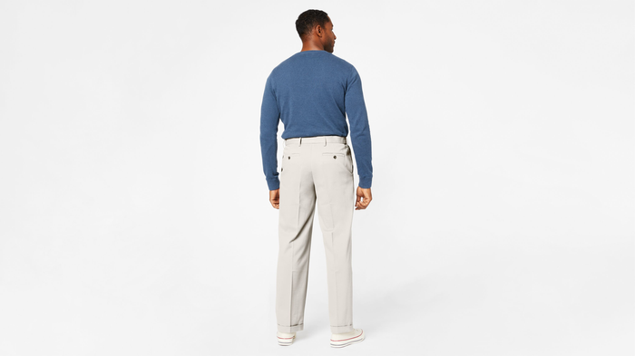 View of model wearing Porcelain Khaki Comfort Khakis, Pleated, Relaxed Fit.