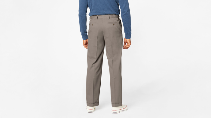 View of model wearing Dark Pebble Comfort Khakis, Pleated, Relaxed Fit.