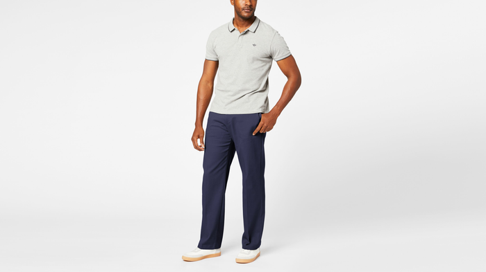 Front view of model wearing Navy Comfort Khakis, Relaxed Fit.