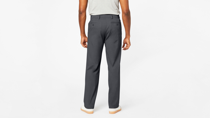 Back view of model wearing Charcoal Comfort Khakis, Relaxed Fit.