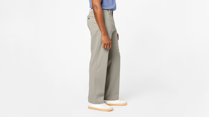 Side view of model wearing Porcelain Khaki Comfort Khakis, Relaxed Fit.