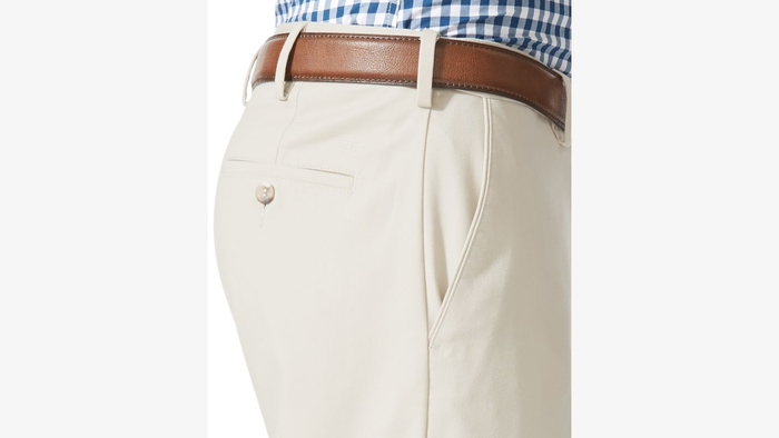 View of model wearing Porcelain Khaki Comfort Khakis, Relaxed Fit.