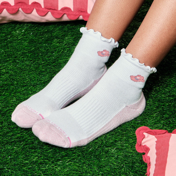 Light blue quarter compression socks with ruffled edges and a pink accent, featuring a small design on the front.