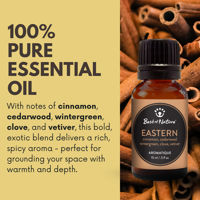Bottle of Eastern essential oil with cinnamon sticks on a beige background