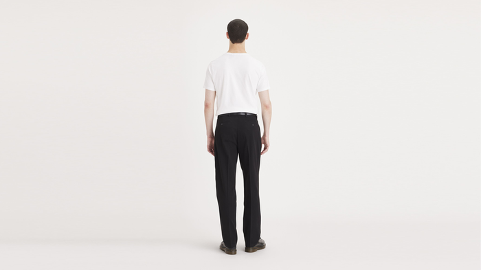 Back view of model wearing Dark Pebble Easy Khakis, Pleated, Classic Fit (Big and Tall).