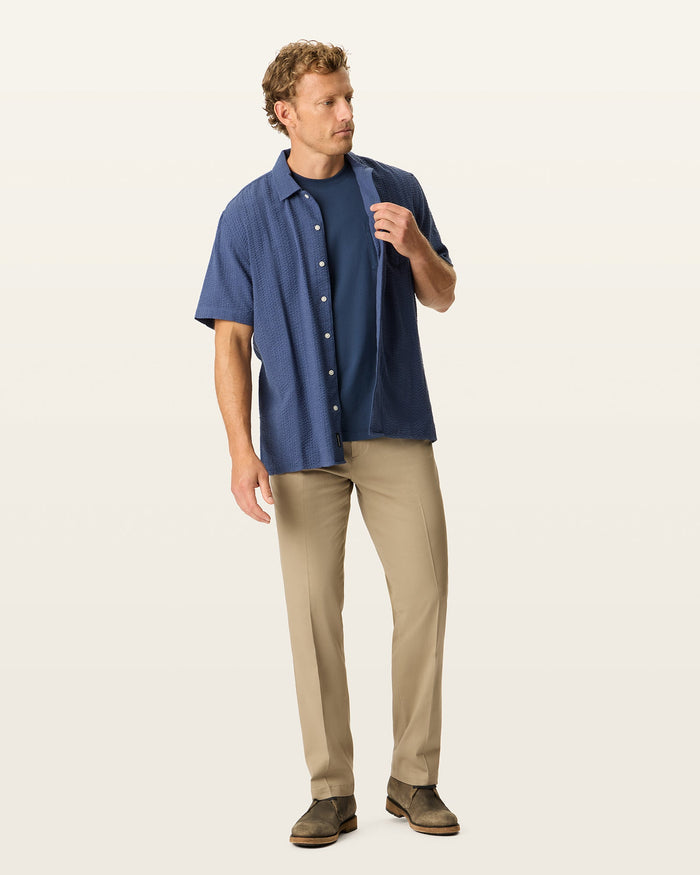 Front view of model wearing Timber Wolf Easy Khakis, Straight Fit.