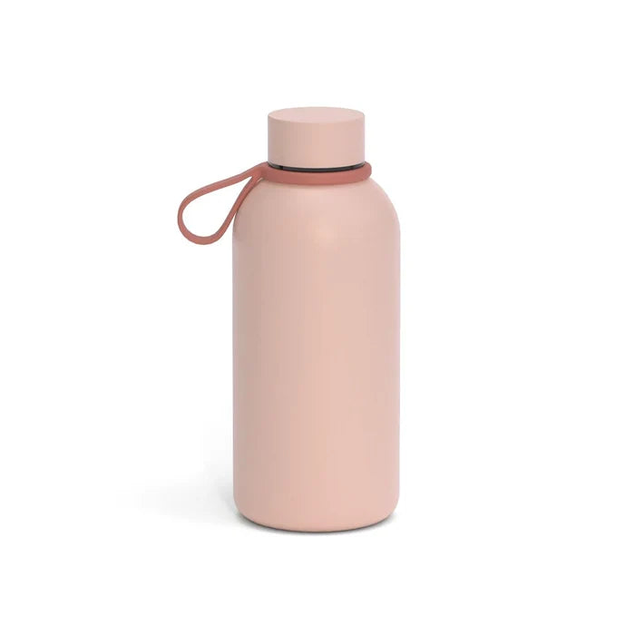 A blush pink insulated reusable water bottle with a darker blush colored silicone strap.