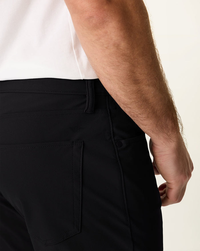 Front view of model wearing Beautiful Black Go Airweave 5-Pocket, Slim Tapered Fit.
