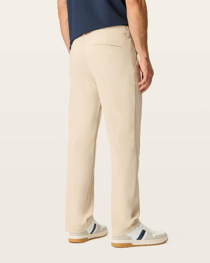 Back view of model wearing Sahara Khaki Go Airweave Chino, Slim Fit.