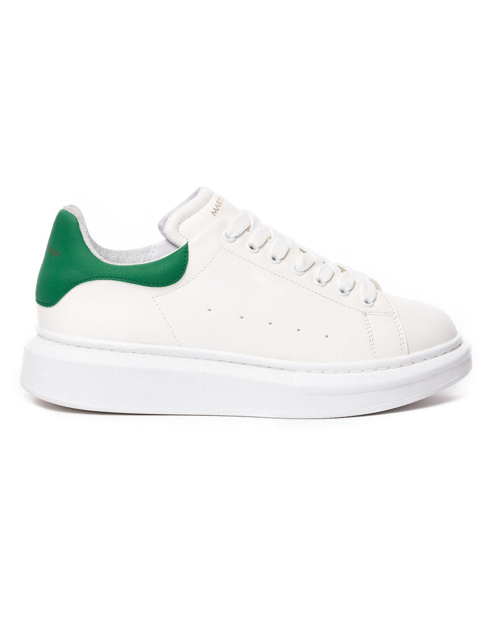 Martin Valen men's chunky white sneaker with green heel, close side view showing laces