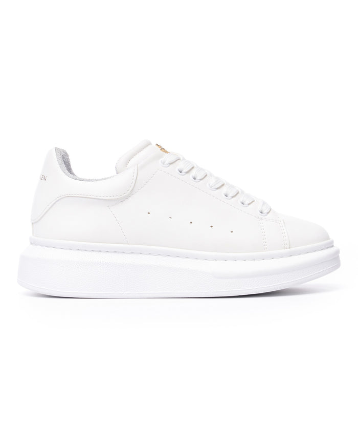 Martin Valen men's white Crowned chunky sneaker, side view showing thick platform sole and lace eyelets