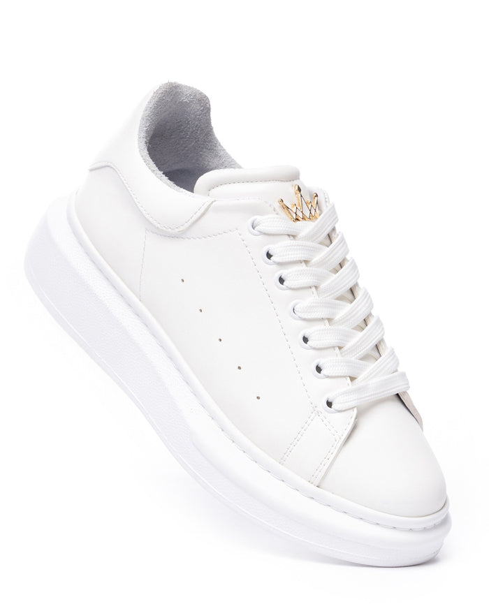 Martin Valen white chunky men’s sneakers, close-side view showing laces and small gold crown detail