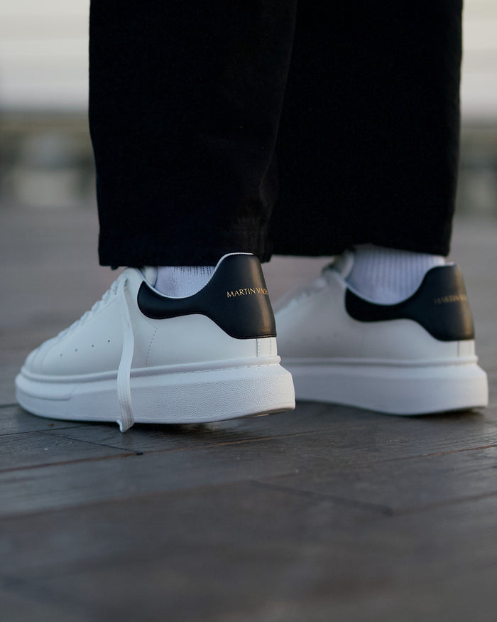 Martin Valen men’s white sneaker with black heel, rear close-up showing the high sole
