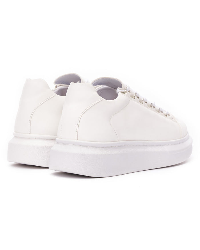 Martin Valen men’s low-top chunky white sneakers, rear three-quarter view showing heel counters and thick white platform soles
