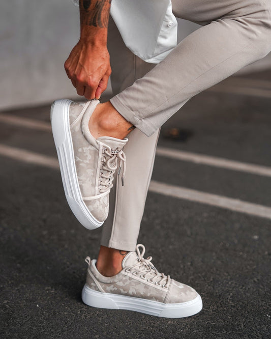 Martin Valen men's low-top cream sneakers, side view with foot tying laces, camo pattern and thick white platform sole