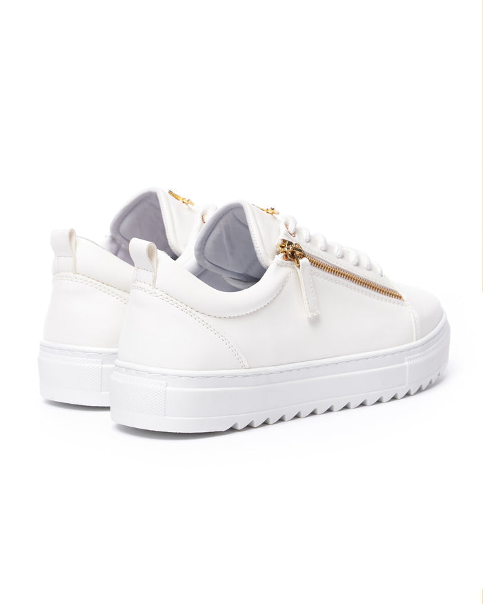 Martin Valen men's low-top white sneakers, rear three-quarter view showing heel pull tab and gold side zipper detail