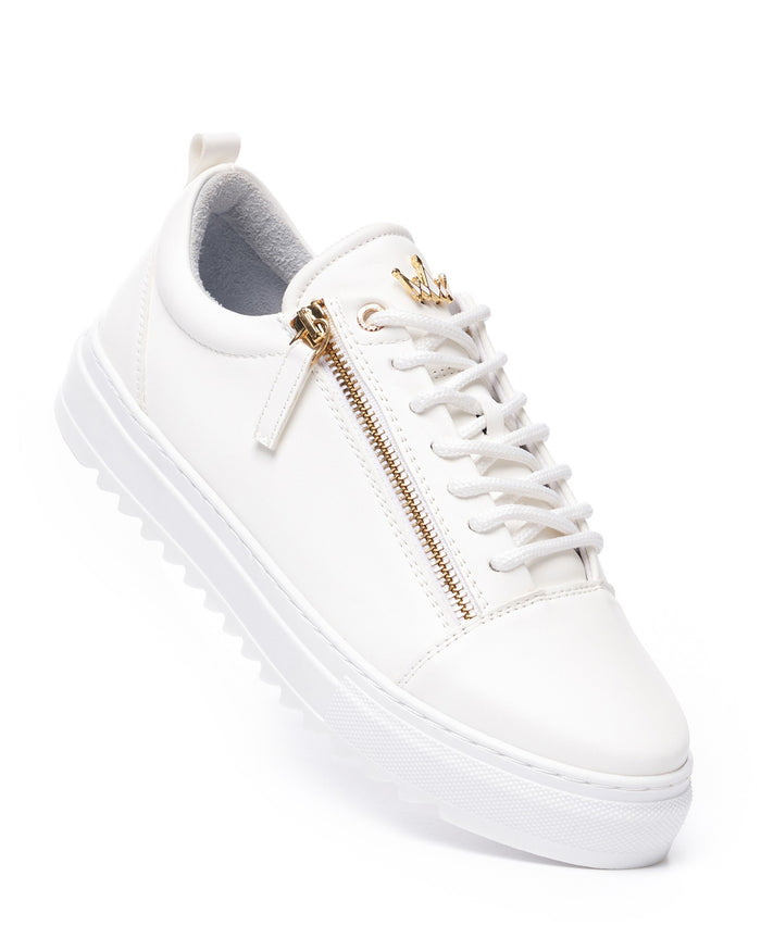 Martin Valen men's low-top white sneaker, elevated close-up of front showing gold zipper, white laces and crown tongue emblem