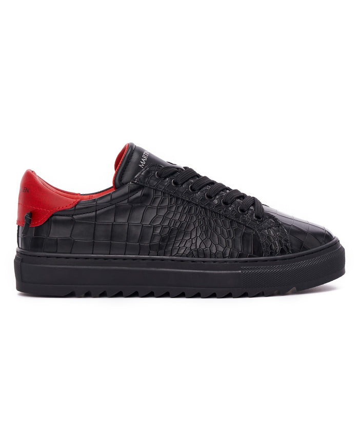 Martin Valen men's low-top black and red sneakers, side close-up showing croc texture and thick platform sole