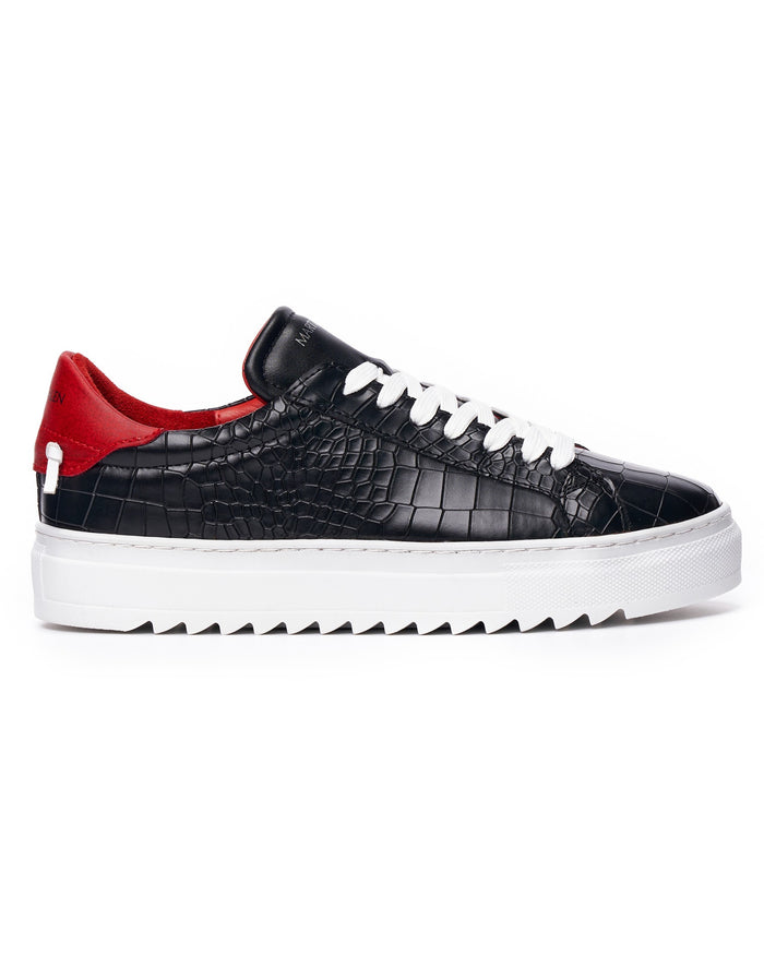 Martin Valen men’s low-top black-white sneakers, side view showing black croc texture, red heel lining and white sole
