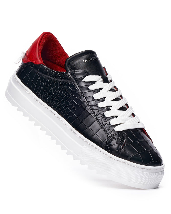 Martin Valen men’s low-top black-white sneaker close-up, white laces, croc texture and red lining visible