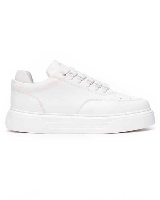 Martin Valen men's low-top white sneaker, side profile on white background showing lace eyelets and chunky sole