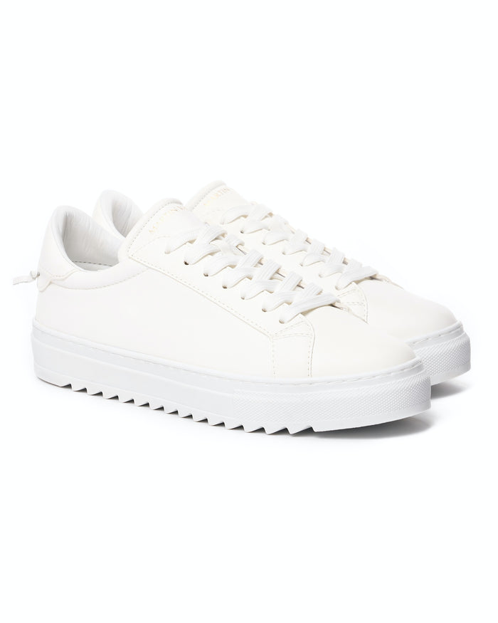 Martin Valen men's low-top white sneakers, front-side close-up showing laces and thick ridged platform sole