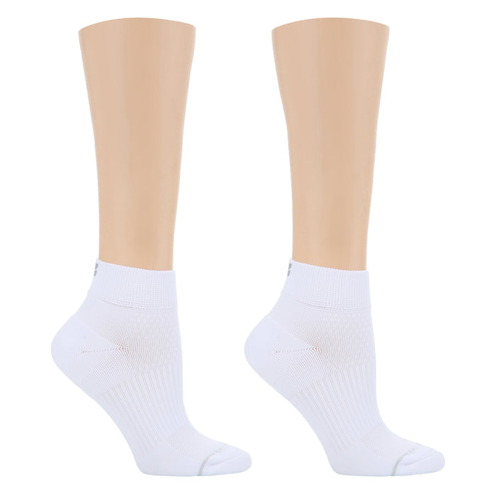 White quarter compression socks with a plain knit texture, displayed on a mannequin leg.