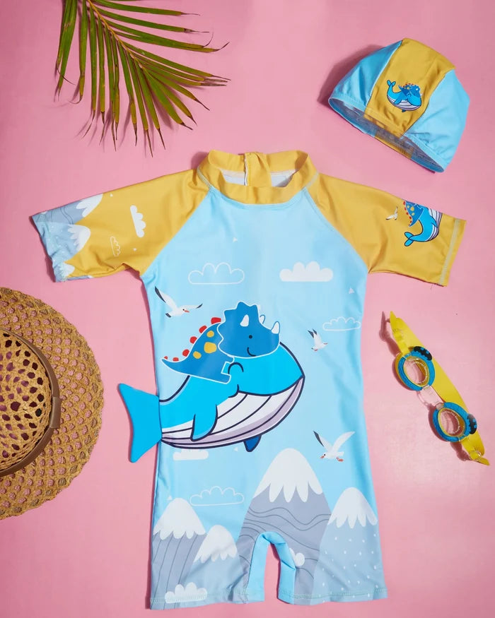 Kids' one-piece swimsuit with half sleeves and shorts, whale print, matching cap
