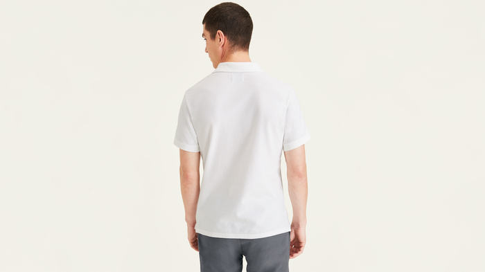 Back view of model wearing Lucent White Rib Collar Polo, Slim Fit.