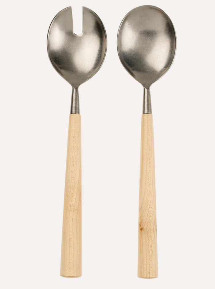 A pair of salad servers with one spoon and one fork, featuring stainless steel heads and maple wood handles with a matte finish.