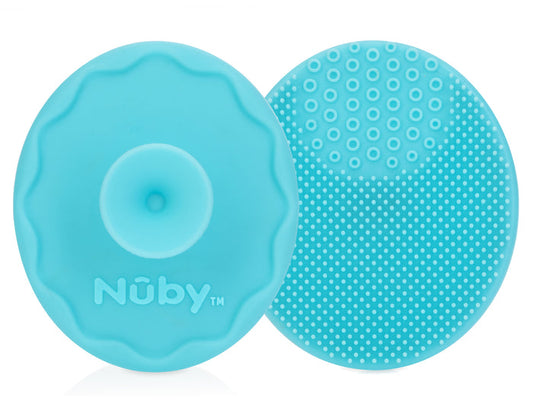 The Nuby Scrubbies Silicone Bath Brush (2 Pack) features round, blue brushes with a textured side for gentle cleaning and soothing baby eczema or cradle cap, and a suction cup side with the Nuby logo for easy storage.